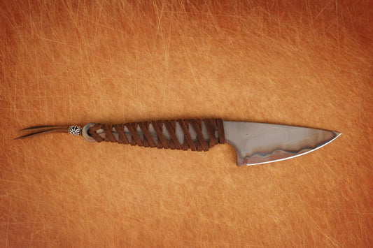 small knife with rainbow colors on blade