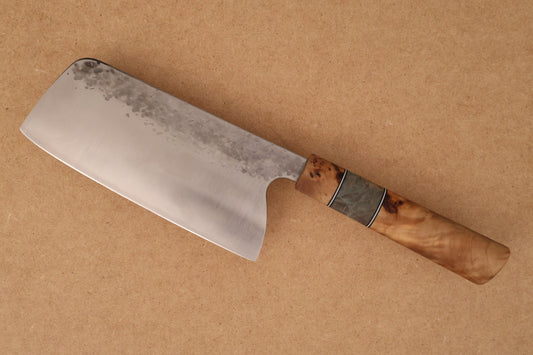 Chinese Cleaver with wooden handle on brown background
