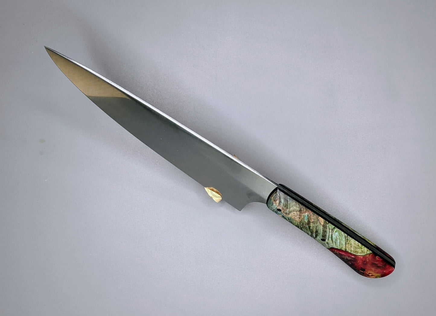Chef knife with green and red hybrid handle