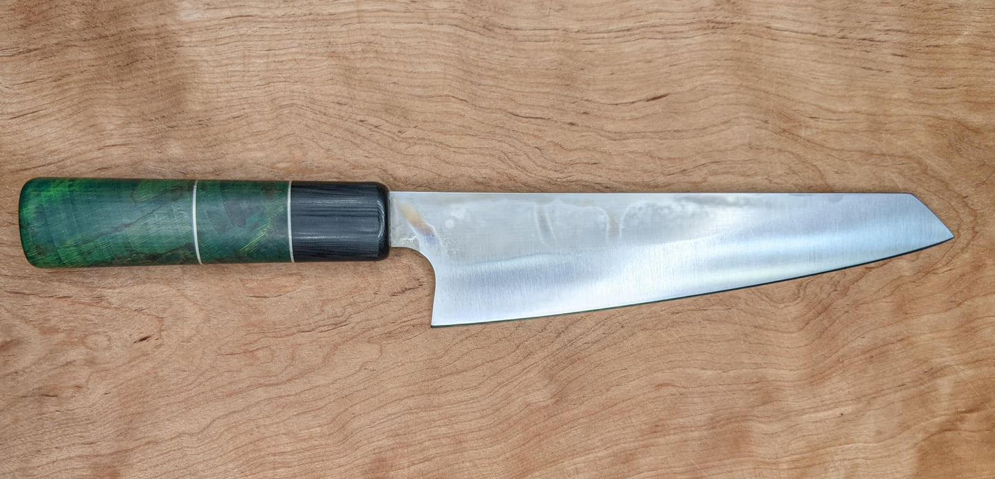 Japanese kitchen knife on wooden background