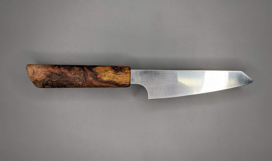 small Japanese kitchen knife with Oak wooden handle on gray background