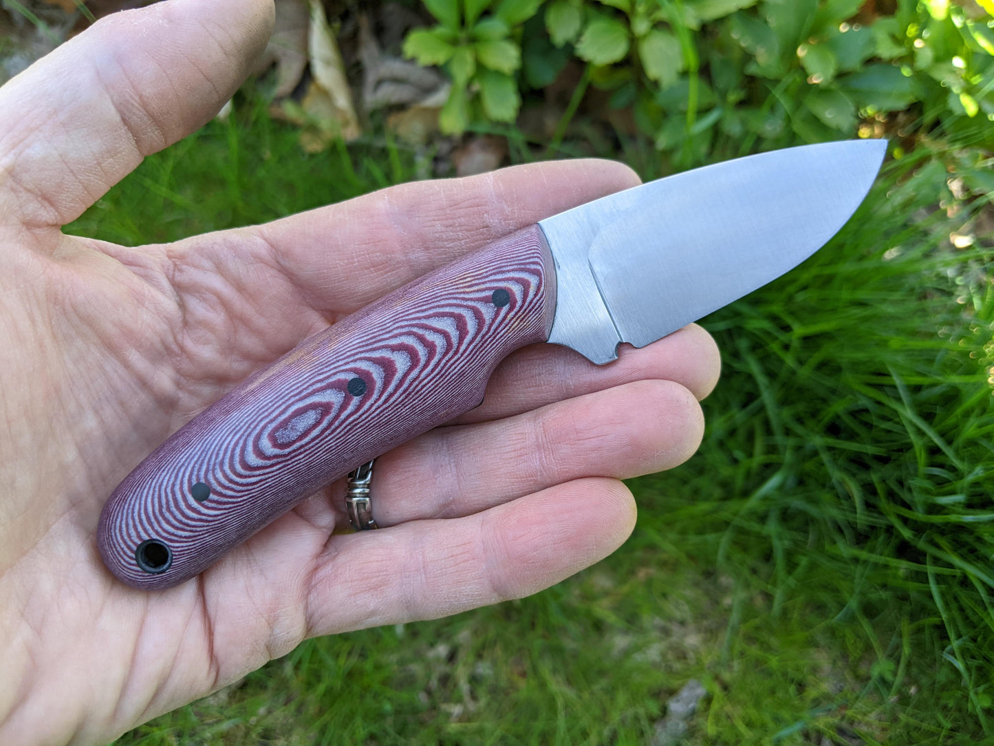 work knife with red handle