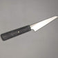 small petty or utility knife with flat cutting edge and angled handle of black Micarta