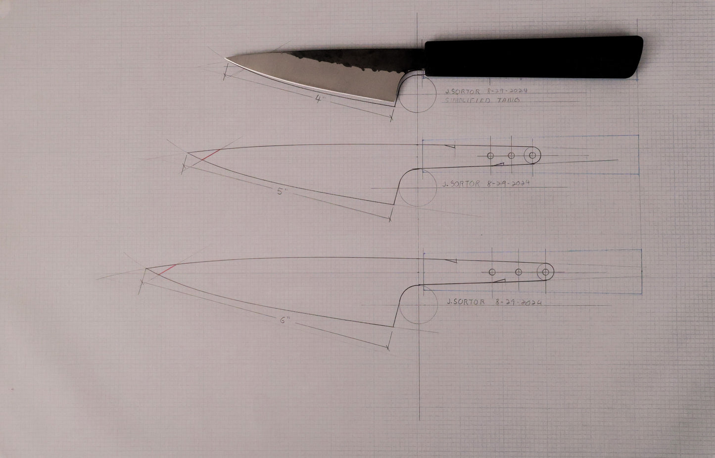 Petty kitchen knife on graph paper with knife drawing underneath 