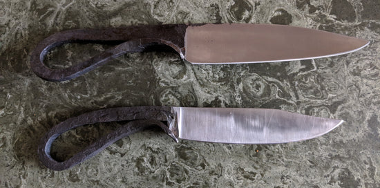 two forged blacksmiths blades 