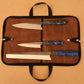 Gift Set of knives in a brown waxed canvas case on a beige background