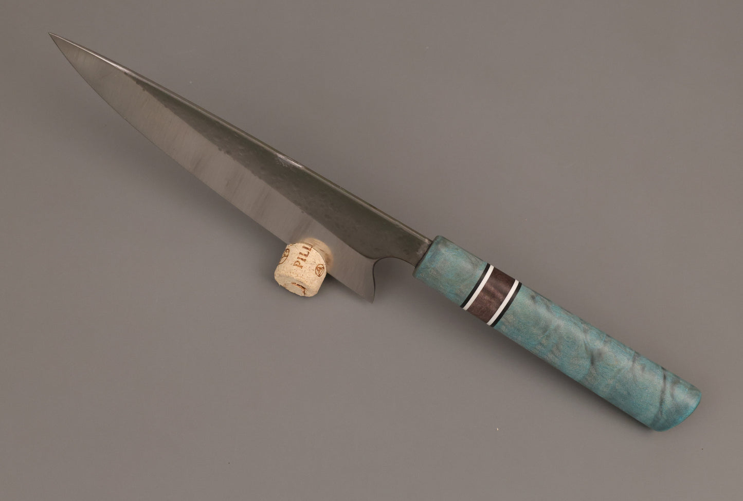 Gyuto kitchen knife with blue wooden handle