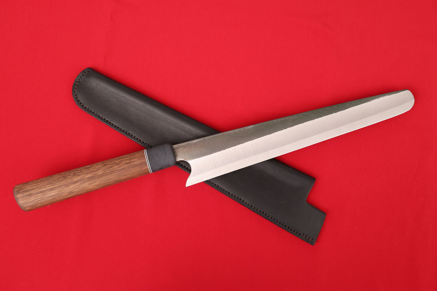 slicing knife with black Lether sheath