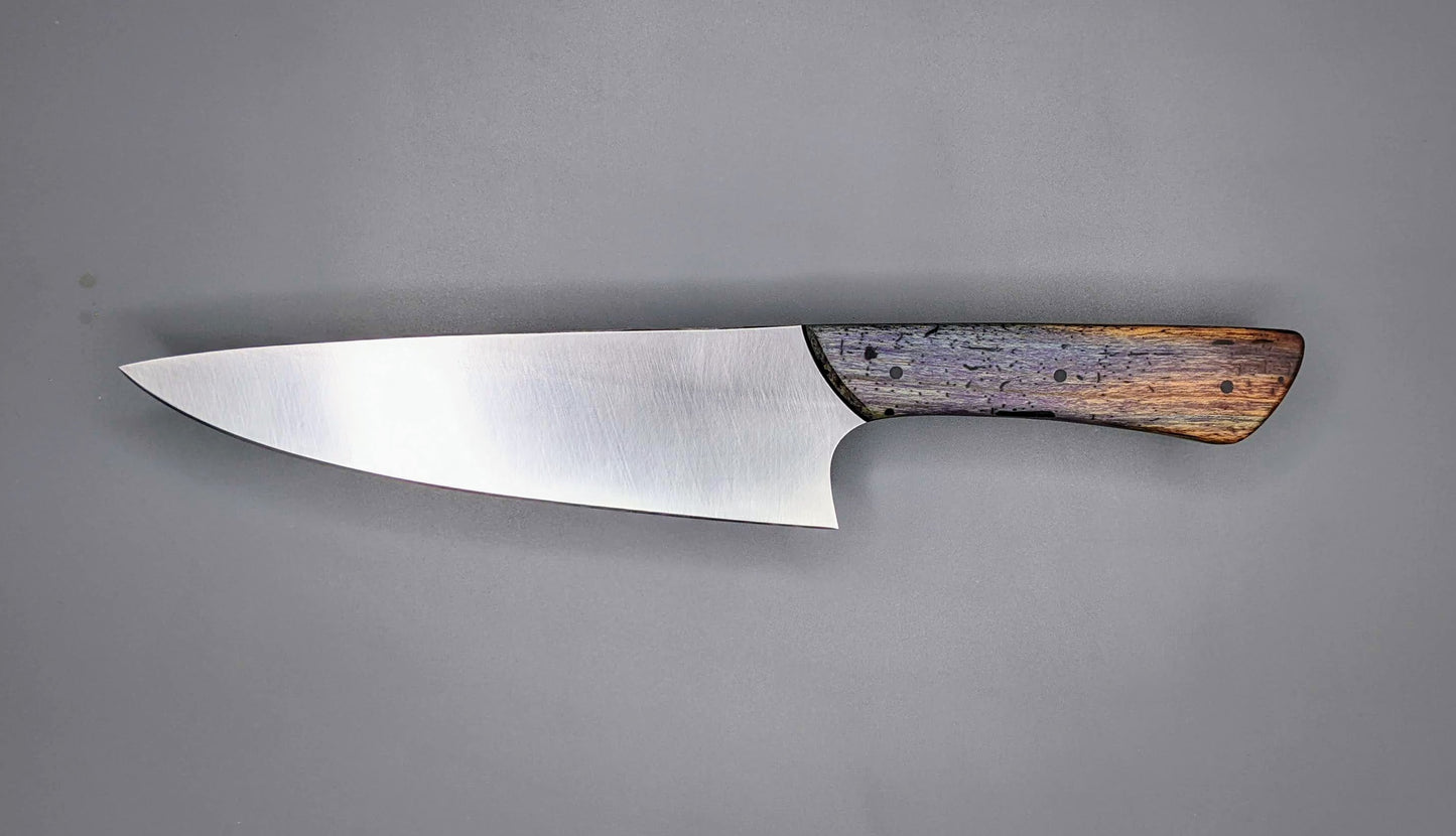 chef knife on gray background with purple and brown wooden handle