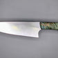 Chef knife on gray background with hybrid handle of green dye Maple and red resin