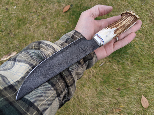 pattern welded blade with stag handle