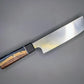 Japanese kitchen knife with wood and resin hybrid handle