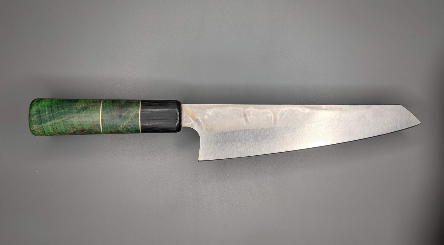 Japanese kitchen knife on gray background with green and black handle