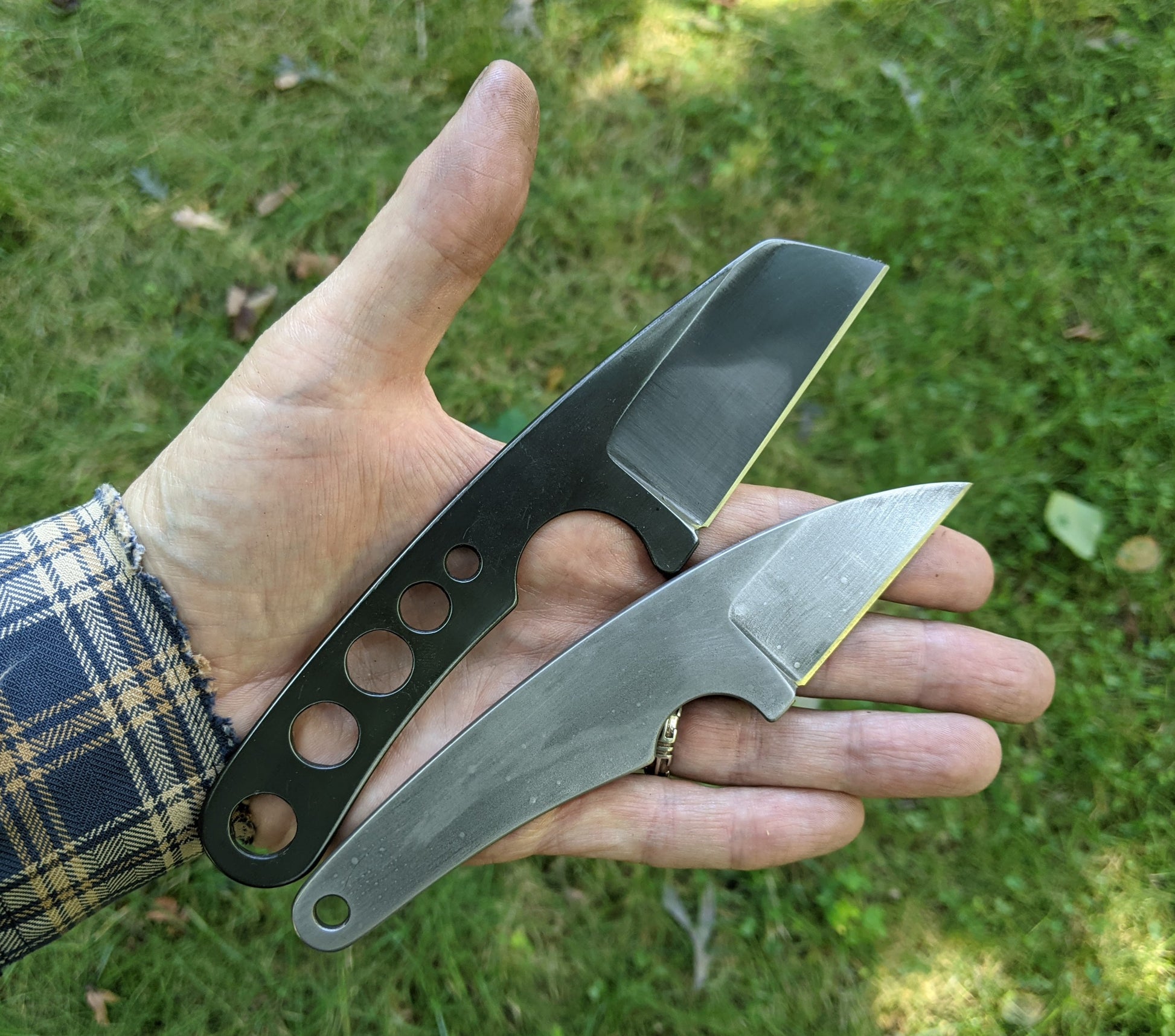 two small knives with single beveled blades